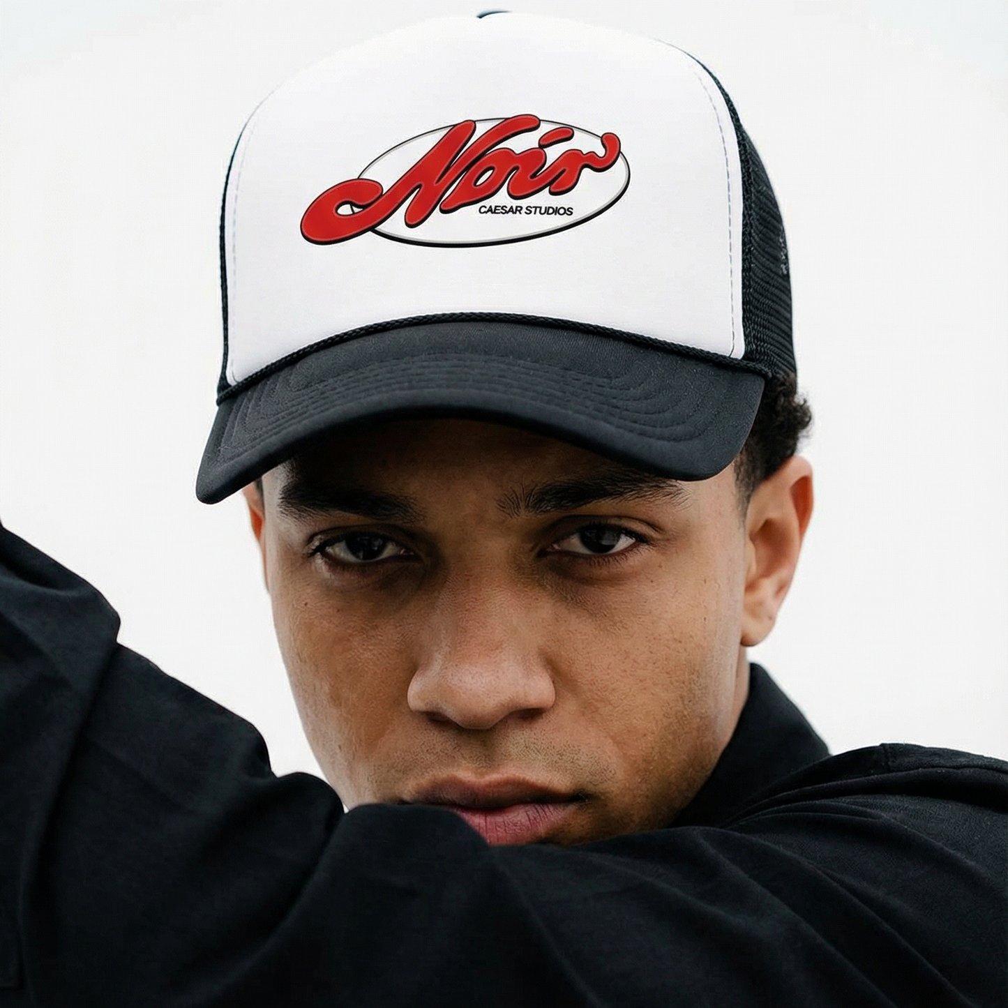 Noir Caesar Stamp It Trucker Hat